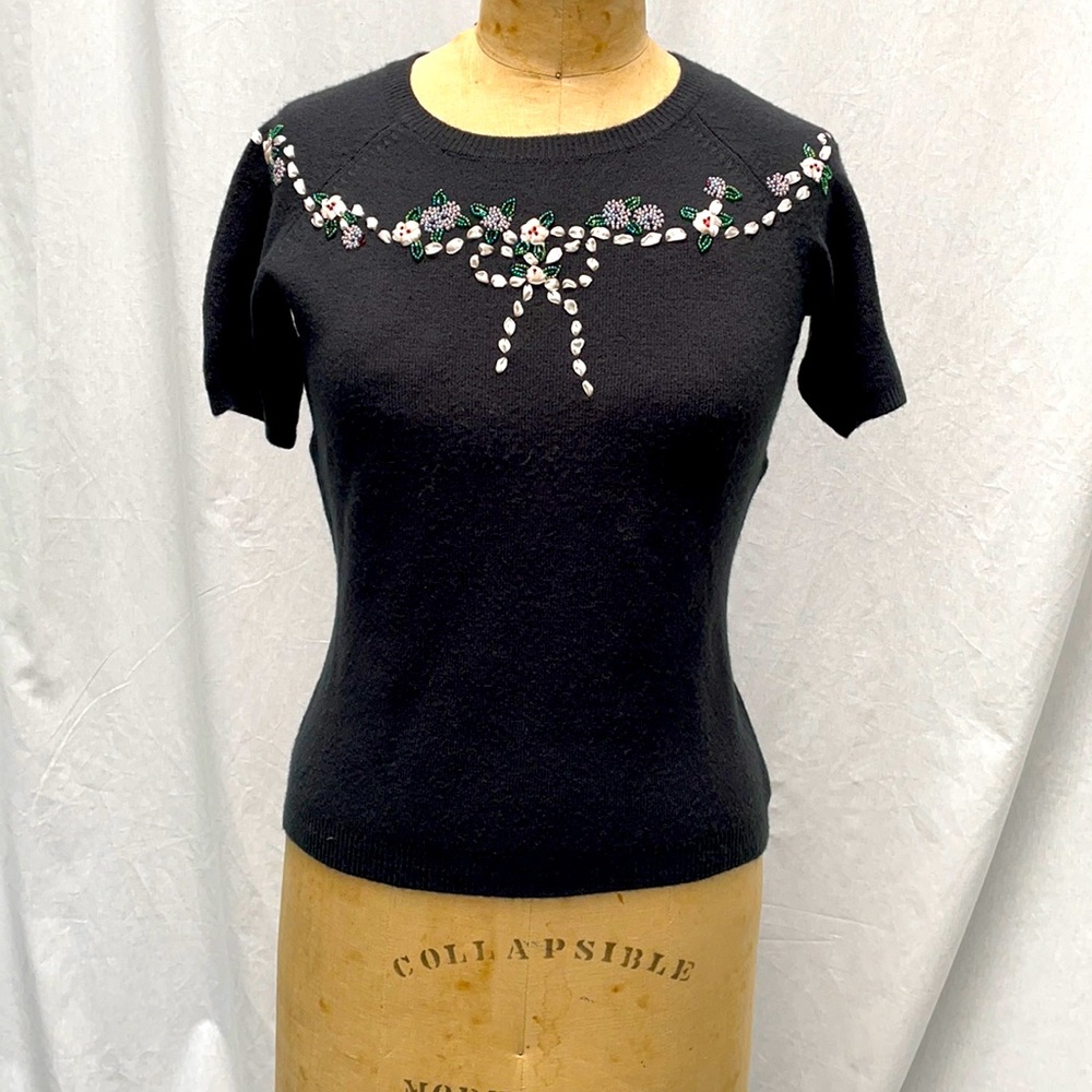 Beautiful cashmere sweater with ribbon & beading.